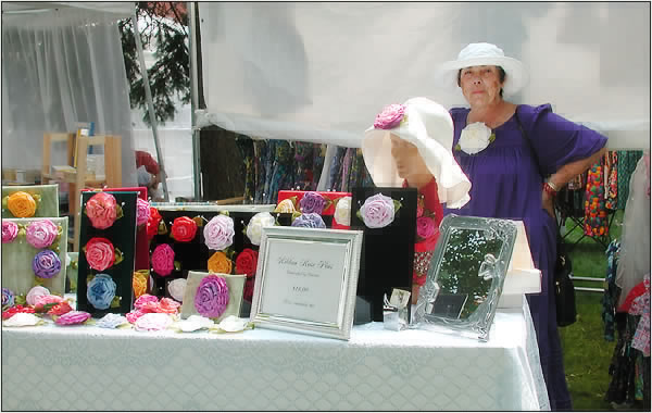 Ribbon Rose Pins by Charlotte Kane at the Artisans' Marketplace, Marblehead Festival of Arts 2001.