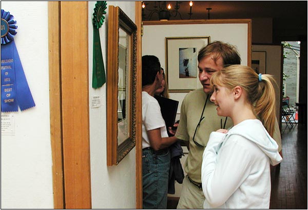 Viewing photographs in Old Town Hall, Marblehead.